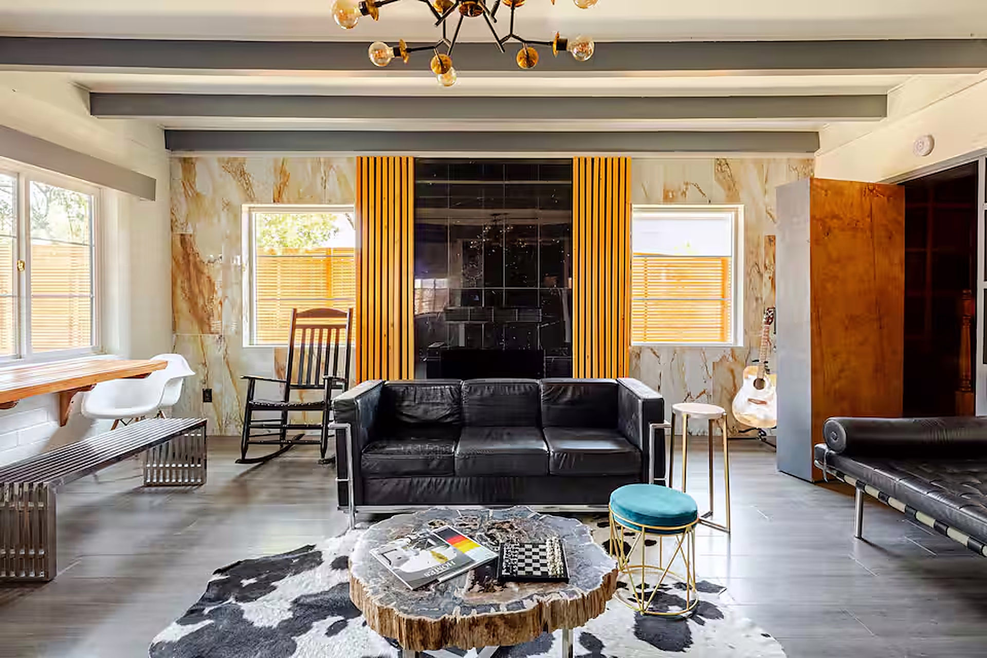 Floor-to-ceiling black marble fireplace