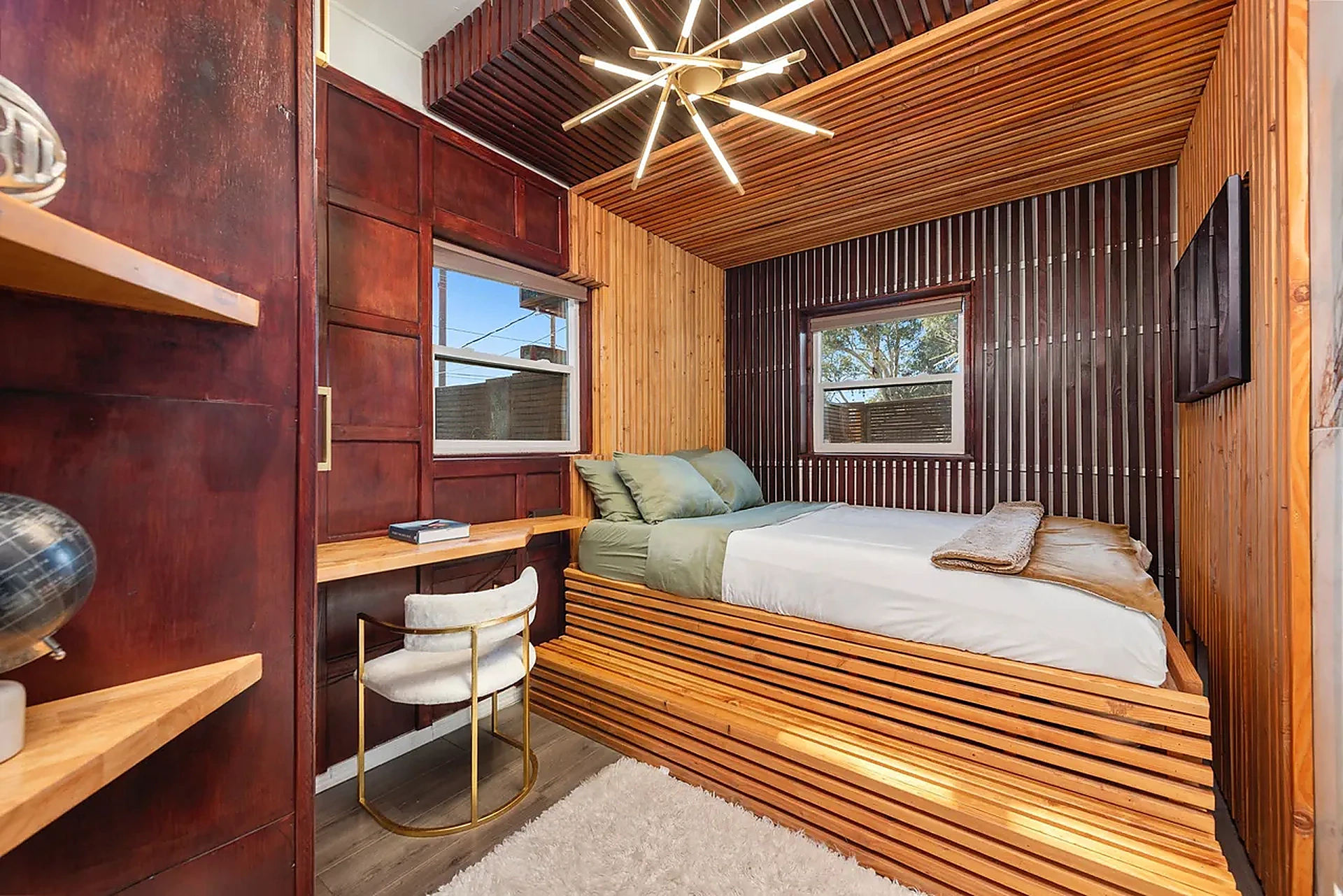 Custom wood bedroom with designer lighting
