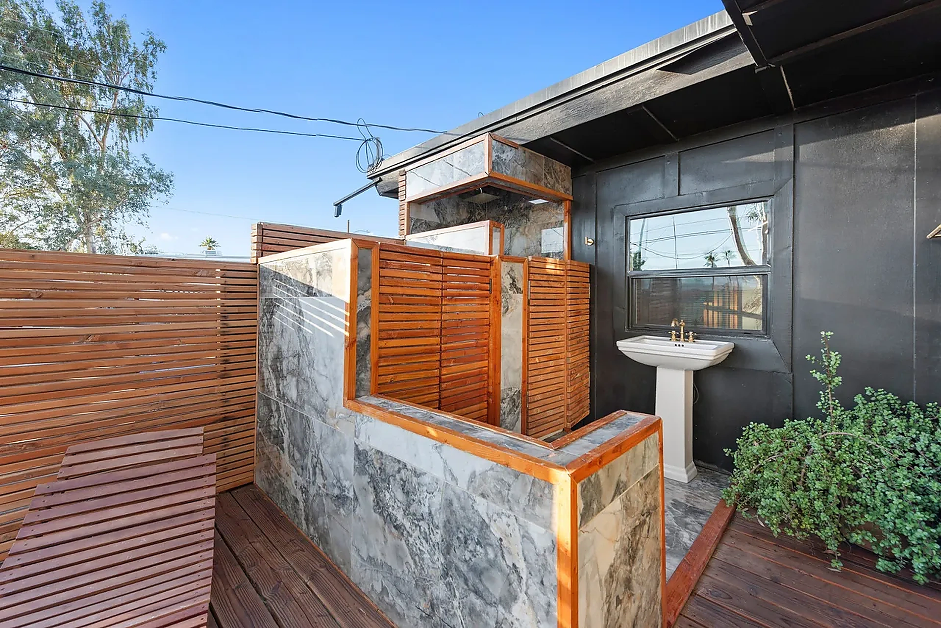Outdoor marble shower and bathroom