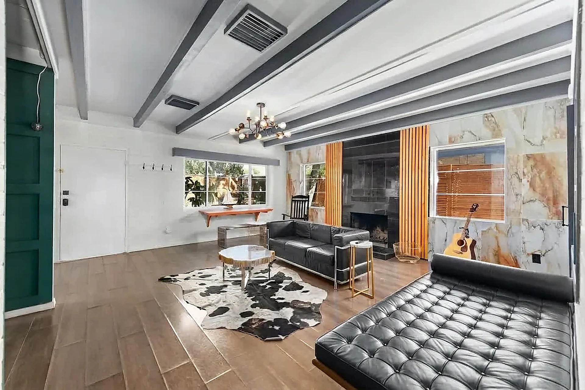 Living room with fireplace and marble wall