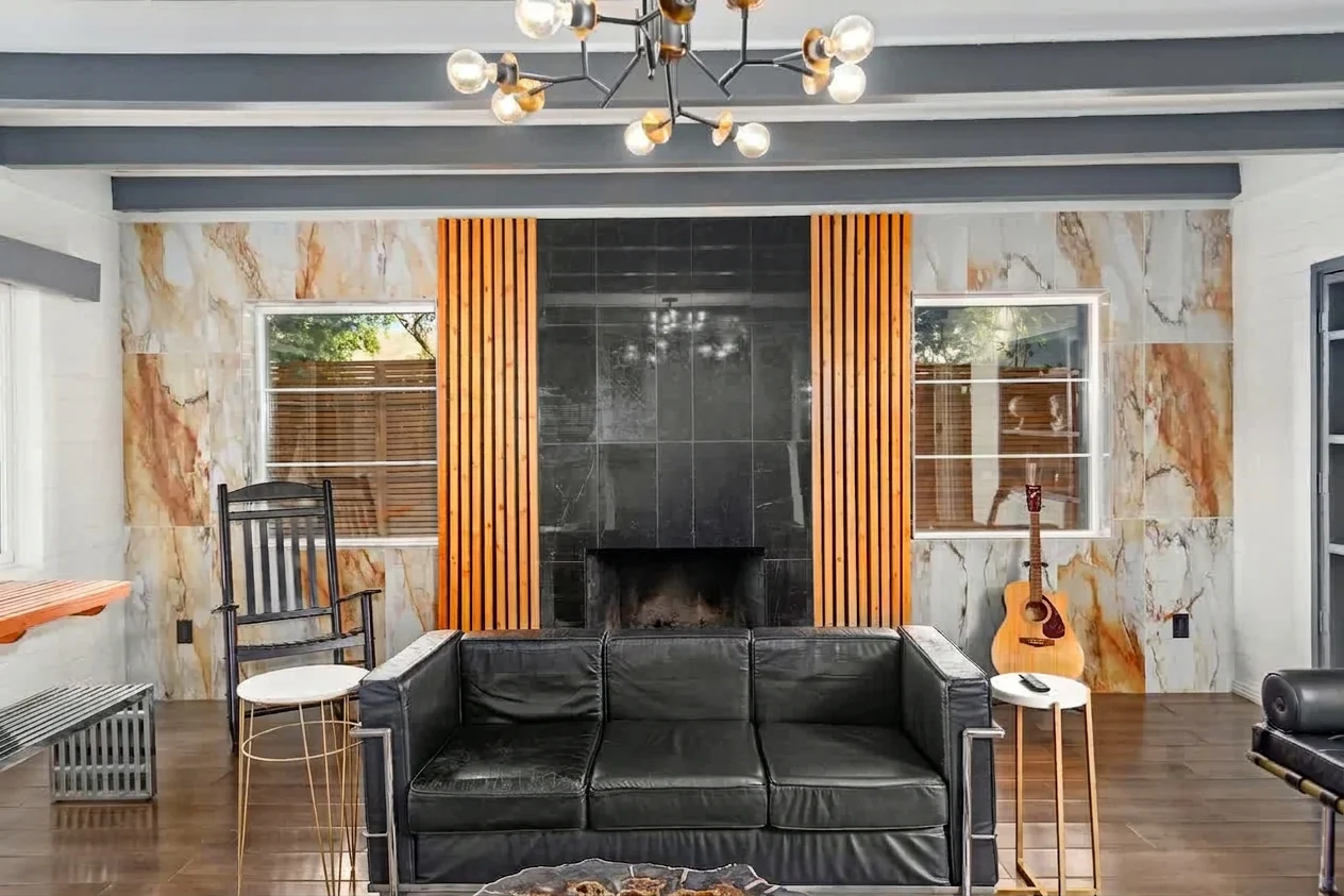 Fireplace detail with marble and wood slats