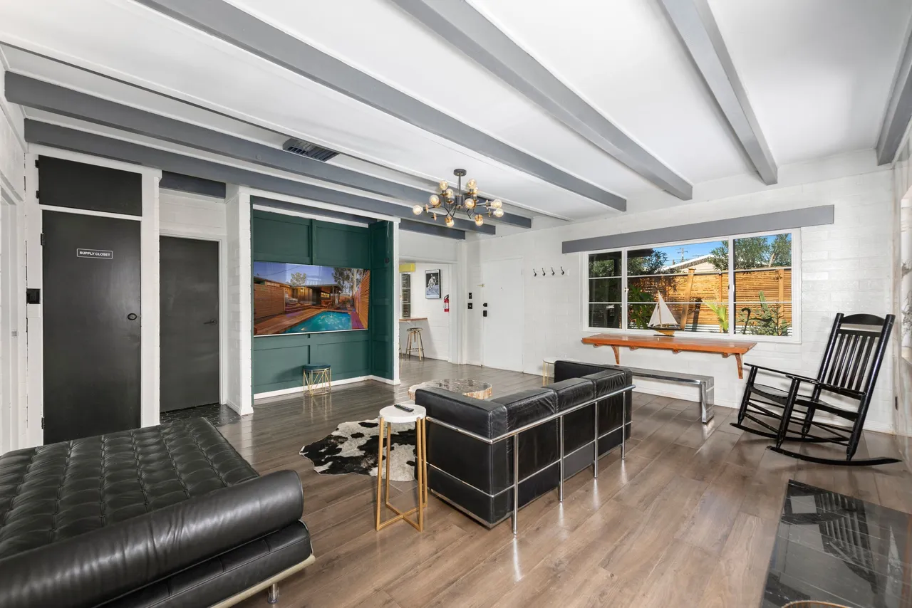 Living area with smart TV and beams