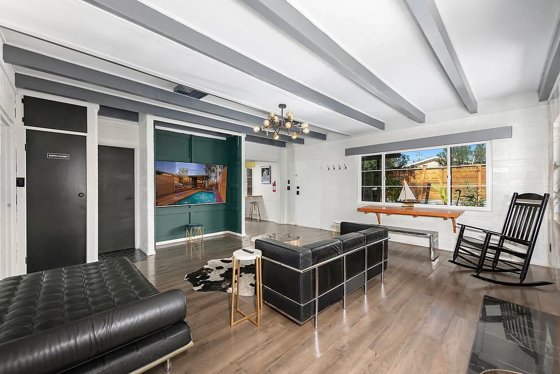 Living area with smart TV and beams